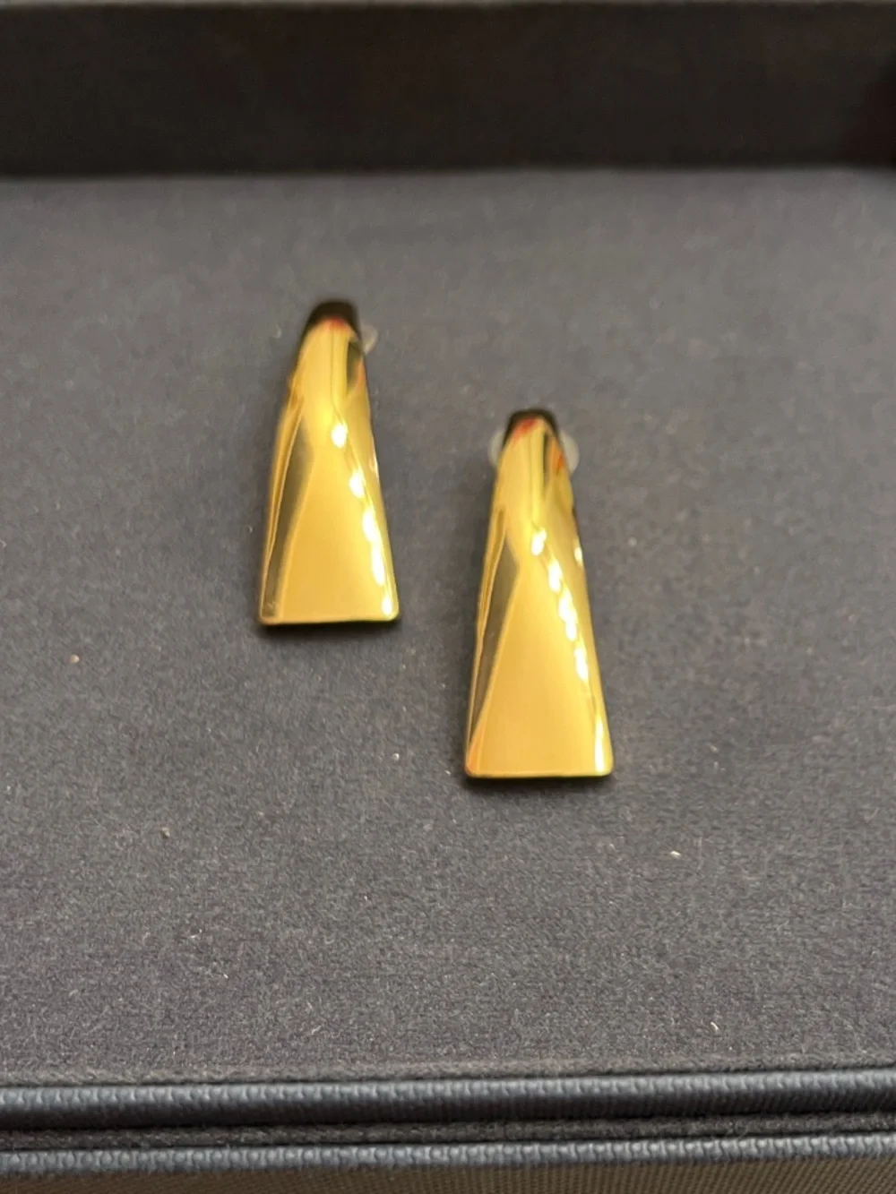 Gold tone earrings
